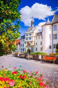 Bad Mergentheim, Germany. Deutschordenplatz of beautiful small town with traditional half-timbered houses on Romantic Road route, travel background of Bavaria.